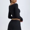 Dalla Modal Button-Detail Low-Rise Mini Skirt in Black