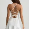 Daria Drop-Waist Lace-Up Mini Dress in White