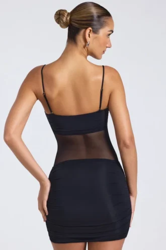 Eislyn Sheer Panelled Ruched Mini Dress in Black