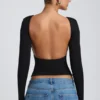 Elli Modal High Neck Long Sleeve Open Back Top in Black