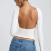 Elli Modal High Neck Long Sleeve Open Back Top in White