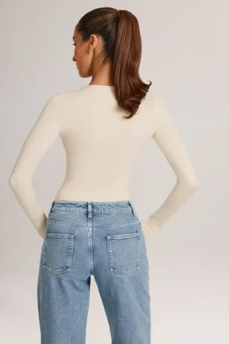 Elodie Modal Plunge Long-Sleeve Bodysuit  in Ivory