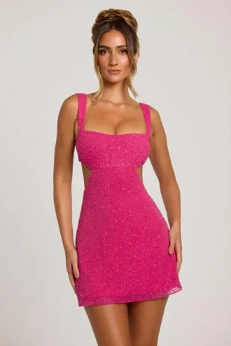 Emilion Embellished Cut Out Mini Dress in Fuschia