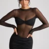 Essie Sheer Panelled Long Sleeve Mini Dress in Black