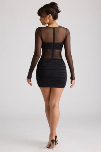 Essie Sheer Panelled Long Sleeve Mini Dress in Black