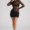Essie Sheer Panelled Long Sleeve Mini Dress in Black