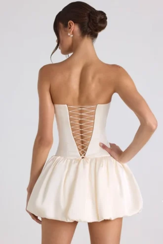 Fabiola Lace-Up Bubble Hem Corset Mini Dress in Ivory