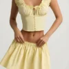 Faela Ruched Cotton-Poplin Corset Top in Lemon Yellow