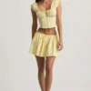Faela Ruched Cotton-Poplin Corset Top in Lemon Yellow