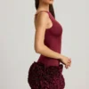 Florrie Satin Floral Appliqué Open-Back Mini Dress in Wine Red