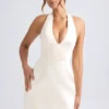 Harmonia Halterneck Structured Tulip Mini Dress in Ivory