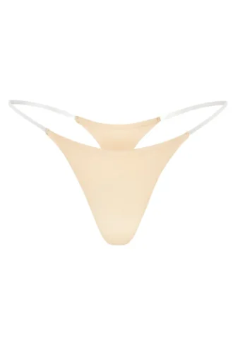 Intimates Seamless Knit Clear Strap Thong in Warm Peach