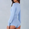 Ismera Knit Long-Sleeve Romper in Soft Blue