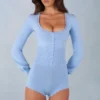 Ismera Knit Long-Sleeve Romper in Soft Blue