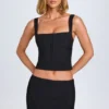 Issa Curved Low-Rise Mini Skirt in Black