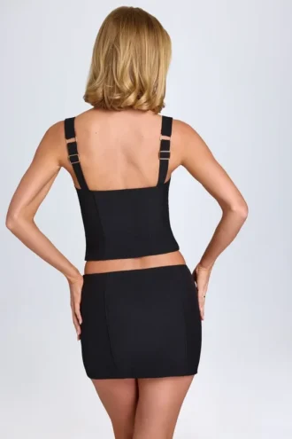 Issa Curved Low-Rise Mini Skirt in Black
