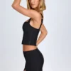 Issa Curved Low-Rise Mini Skirt in Black