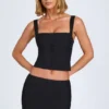Issa Curved Low-Rise Mini Skirt in Black