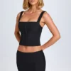 Issa Curved Low-Rise Mini Skirt in Black