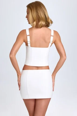 Issa Curved Low-Rise Mini Skirt in White