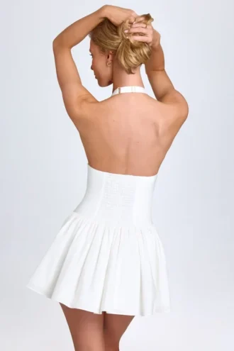 jessalie pintucked halterneck mini dress in white 2 330x495 - Jessalie Pintucked Halterneck Mini Dress in White