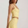 Jianna Embellished Low-Rise Mini Skirt in Yellow