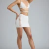 Joni Embellished Mid-Rise Mini Skirt in Ivory