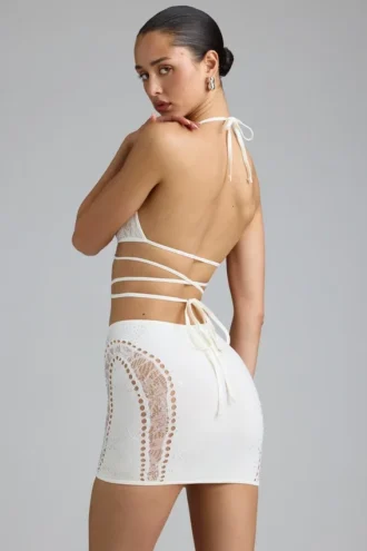 joni embellished mid rise mini skirt in ivory 4 330x495 - Liberty Embellished Cross-Strap Bikini Top in Ivory