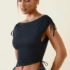 Kaede Asymmetric Ruched Cowl-Back Crop Top in Black Kaede Asymmetric Ruched Cowl-Back Crop Top in Black