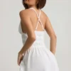 Kaelis Plunge Cross-Back Mini Dress in White Kaelis Plunge Cross-Back Mini Dress in White