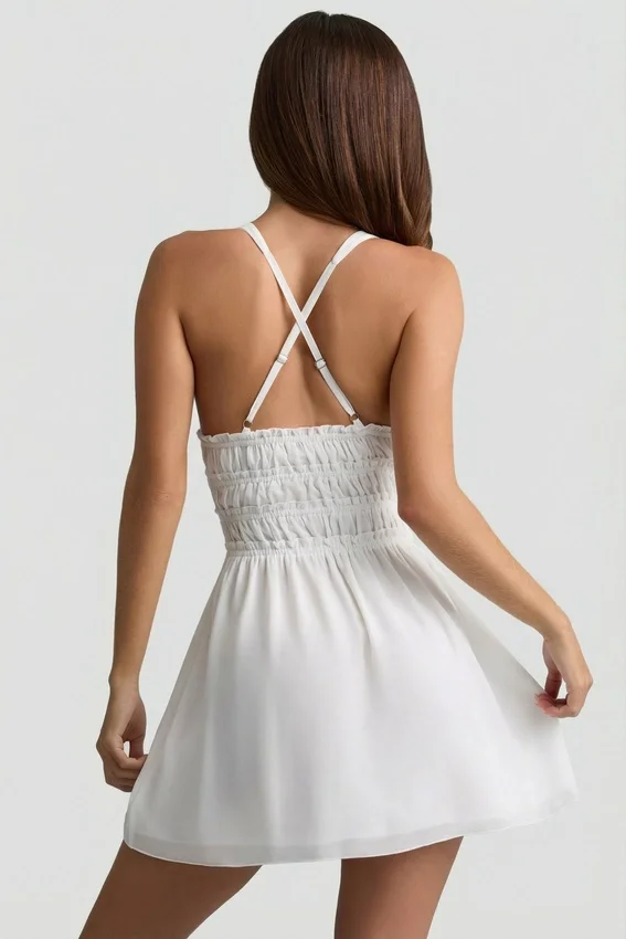 Kaelis Plunge Cross-Back Mini Dress in White Kaelis Plunge Cross-Back Mini Dress in White