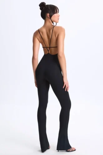 Kiki Modal Plunge Open-Back Flared Jumpsuit in Black
