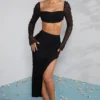 La Desirade Embellished Cowl Neck Crop Top in Black