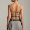 Leilani Belted Backless Pleated Mini Dress in Grey