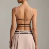 Leilani Belted Backless Pleated Mini Dress in Mushroom