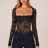 Letizia Long-Sleeve Laced Bodysuit in Black