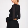 Liah Sheer Jersey Plunge Long-Sleeve Top in Black