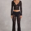 Lioren Sheer Lace Plunge-Neck Long-Sleeve Top in Black