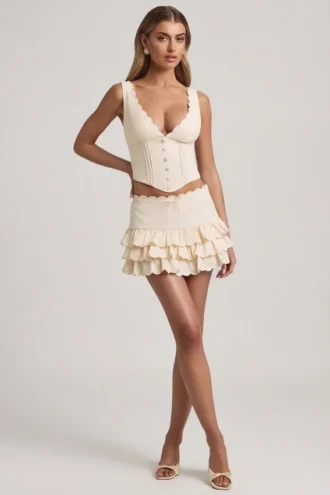 Lorena Layered Ruffled Low-Rise Mini Skirt in Ivory