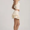 Lorena Layered Ruffled Low-Rise Mini Skirt in Ivory