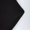 Luanni Slinky Jersey Backless Mini Dress in Black