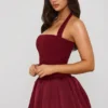 Ludmila Halterneck Lace-Up Bubble Hem Corset Micro Mini Dress in Berry Red