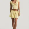 Maira Ruched Cotton-Poplin Mini Skirt in Lemon Yellow