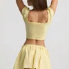 Maira Ruched Cotton-Poplin Mini Skirt in Lemon Yellow