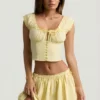 Maira Ruched Cotton-Poplin Mini Skirt in Lemon Yellow