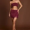 Maristella Fringed Mid-Rise Mini Skirt in Wine Red