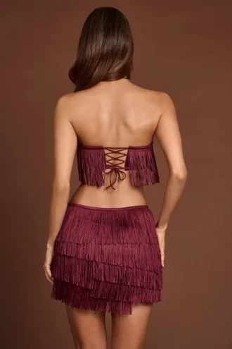 Maristella Fringed Mid-Rise Mini Skirt in Wine Red