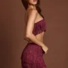 Maristella Fringed Mid-Rise Mini Skirt in Wine Red