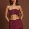 Maristella Fringed Mid-Rise Mini Skirt in Wine Red