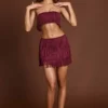 Maristella Fringed Mid-Rise Mini Skirt in Wine Red